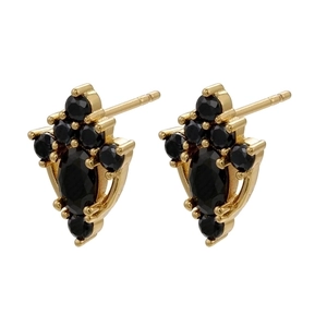 Detail of vintage gold shield earrings featuring oval black stones and micro-pave crystals