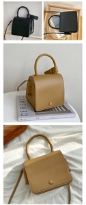 Minimalist square faux leather handbags in black and khaki shown in a lifestyle setting