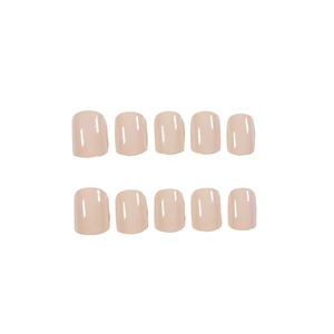 Glossy nude beige short press-on nails in a minimalist solid color square round design