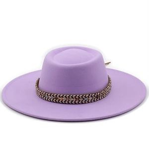 Detail view of lavender wool felt flat top hat with ethnic patterned woven band