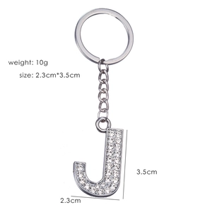 Detailed view of silver letter J keychain with rhinestones showing 2.3cm by 3.5cm size