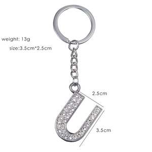 Detailed view of silver letter U keychain with rhinestones, 3.5cm charm size and 13g weight