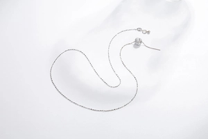 Detailed macro view of S925 sterling silver adjustable necklace with a spherical slider bead