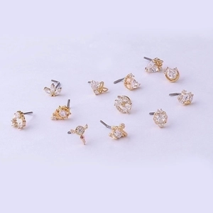 Set of 20G gold titanium steel nose studs with crystal heart and crown designs