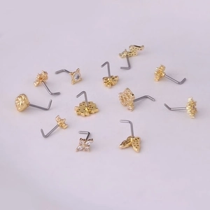 Various 20G gold titanium steel nose studs with cubic zirconia butterfly and flower designs