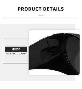 Close-up of durable metal hinge on black oversized sunglasses for secure fit