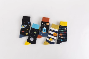 Detail of 5 pairs of kids cotton socks with space planets and rocket patterns