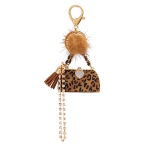 Leopard print handbag keychain with brown faux fur pom pom and gold hardware