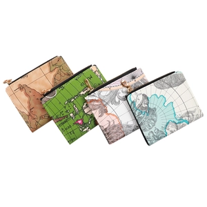Detailed view of four vintage map print mini pouches in brown, green, pink, and blue colors