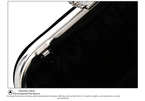 Detailed macro view of silver electroplated stainless steel hardware on a black clutch