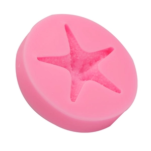 Détail du moule en silicone étoile de mer rose pour décor de gâteaux et chocolats