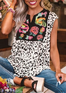 Detail of V-neck leopard print T-shirt with floral patch on a casual short sleeve top