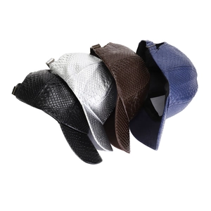Detail of multi-color PU leather baseball caps with embossed crocodile skin texture