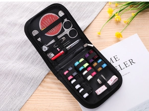 Detailed sewing kit set showing various colorful threads and tools in a black zipper case