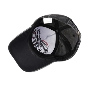 Washed cotton baseball cap interior detail with shark embroidery and 100% cotton label