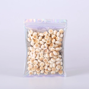 Holographic laser resealable pouch for accessories and gifts showing rainbow reflections