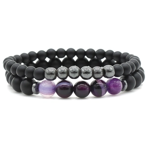 Matte black stone beaded bracelets set with purple agate and silver metallic spacers