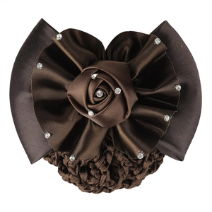 Macro view of dark brown satin bow hairnet with fabric rose and sparkling rhinestones