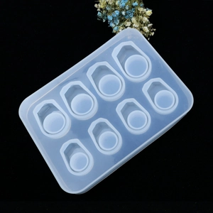 Macro view of 8-cavity translucent silicone resin mold for DIY geometric jewelry making
