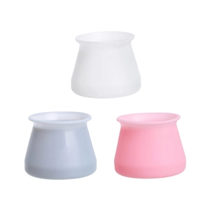 Tapered silicone chair leg protectors in white, light blue, and pink for floor protection