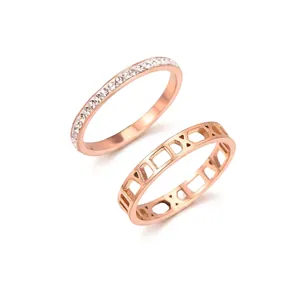 Two-in-one rose gold titanium steel ring set with hollow Roman numerals and pavé diamonds