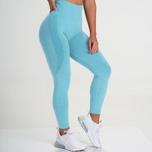Detailed close-up of sky blue high-waisted seamless yoga leggings with peach butt lifting effect