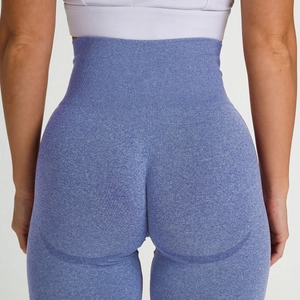 Detail of high waisted seamless yoga pants showing peach butt lifting design and knit fabric