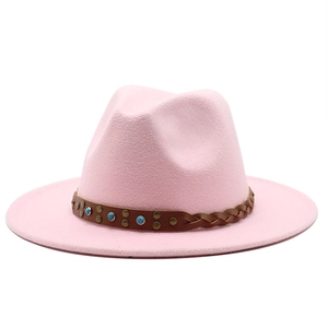 Pink wool fedora hat with brown leather band featuring turquoise beads and metal studs