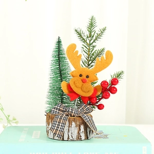 Miniature Christmas tree with wooden base, red berries and cute felt reindeer character