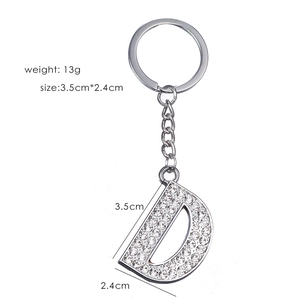 Silver metal letter D keychain with white rhinestones showing 3.5cm height dimensions