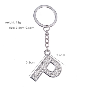Detailed size view of silver metal letter P keychain with sparkling rhinestones inlay