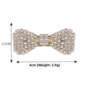 Detailed view of silver rhinestone bow hair clip with size 4cm x 2.2cm and 5.9g weight