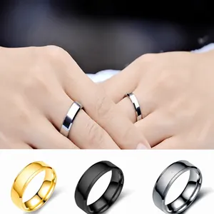 Smooth titanium steel rings in gold, black and silver finishes for couples and men.