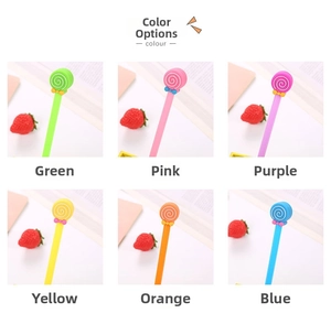 Detailed view of colorful lollipop pens with cute silicone tops and decorative bows