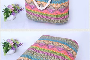 Detail of colorful geometric canvas tote bag with thick cotton rope handle for summer