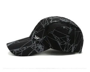 Detail view of breathable side mesh and grey geometric patterns on black sport cap