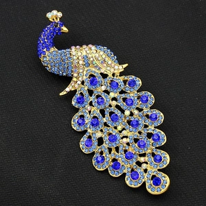 Exquisite gold-tone royal blue crystal peacock animal brooch pin with sparkling rhinestones