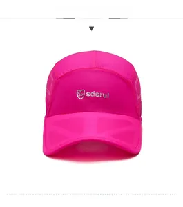 Close-up of rose red breathable mesh cap with quick-dry fabric and silver shield logo