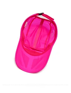Detail of the inner mesh structure and adjustable strap of this pink baseball cap