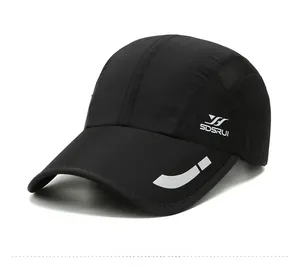 Detail view of black quick-dry sports cap with breathable mesh and reflective trim