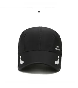 Detail view of the black quick-dry sport cap showing side mesh vents and reflective strips