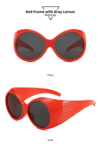 Detailed front and side view of oversized round sunglasses in glossy red frames