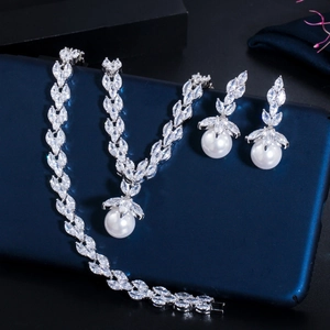 Silver bridal jewelry set featuring marquise zirconia and pearls for wedding gowns