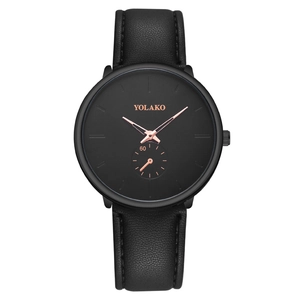Minimalist men's black leather watch with rose gold indices and sub-dial on white background