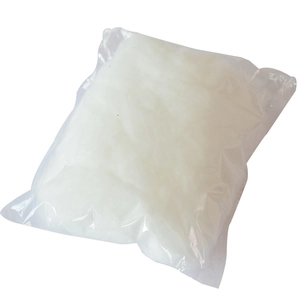 Artificial white cotton snow fluff for Christmas tree decoration in clear plastic packaging
