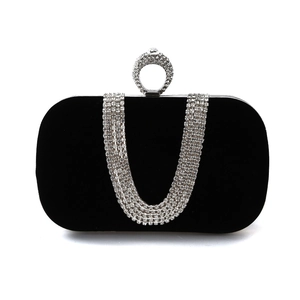 Luxurious black velvet evening clutch bag with sparkling rhinestone ring clasp and chains