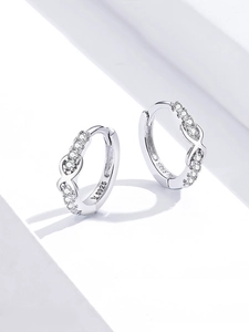 Detailed view of S925 sterling silver hoop earrings with cubic zirconia infinity symbol