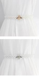 Détail de chaîne de taille en perles avec boucle abeille en strass en or et argent