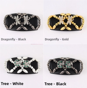 Detail view of dragonfly and tree beaded hair combs with rhinestones and pearls
