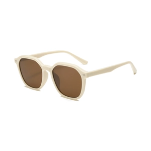 Classic cream hexagonal sunglasses with dark brown lenses in a 45-degree angle view